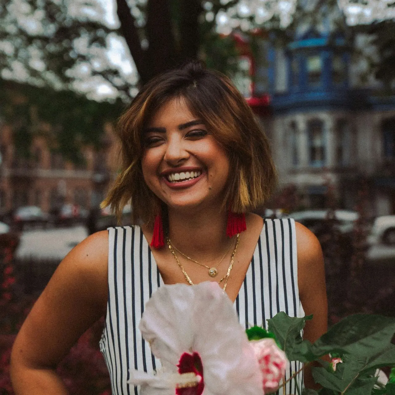 woman near white flower